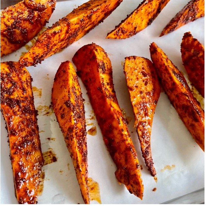 Image of In a bowl, toss the sweet potato, Cataluña spices, salt...